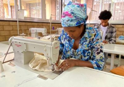 Ethiopian Woman Learning to sew.jpg