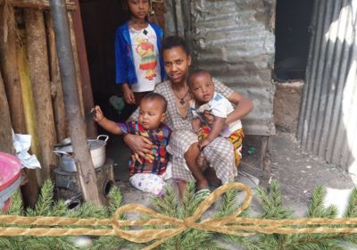 Family with twins living in poverty in Korah Ethiopia mud hut