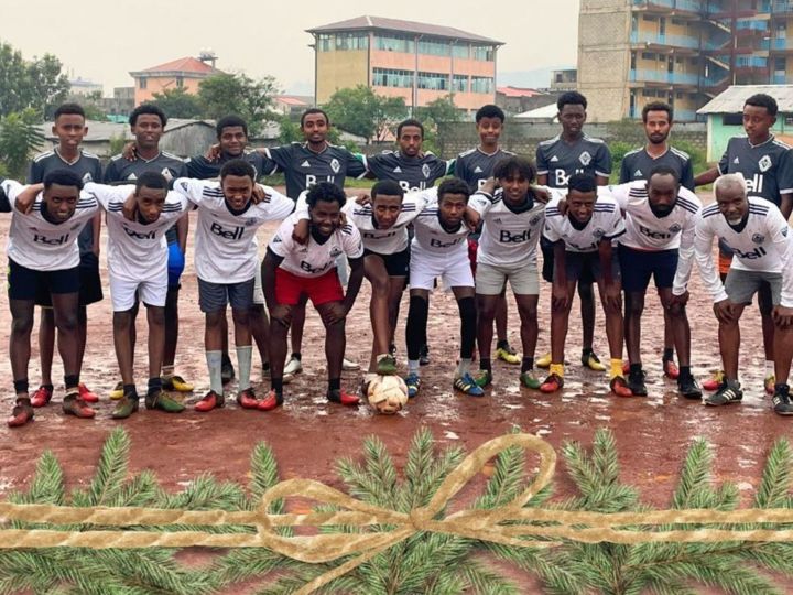 Boys soccer team on field in Korah Ethiopia