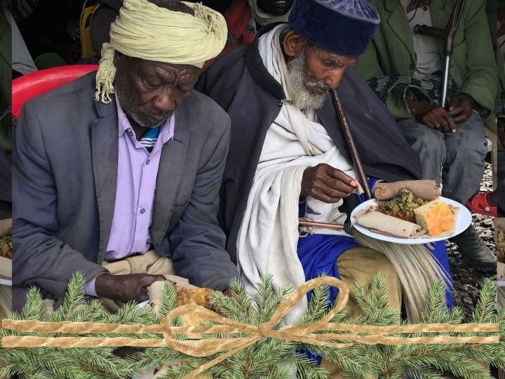 Elderly men at community feeding program in Korah Ethiopia