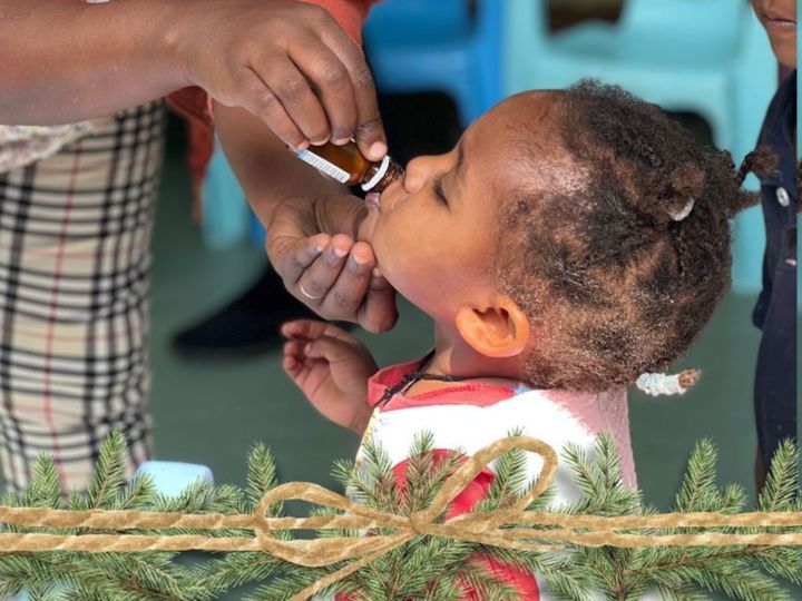 young child receiving deworming medication in Korah Ethiopia