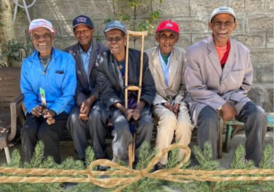 Group of elderly men living with leprosy at compound where they live