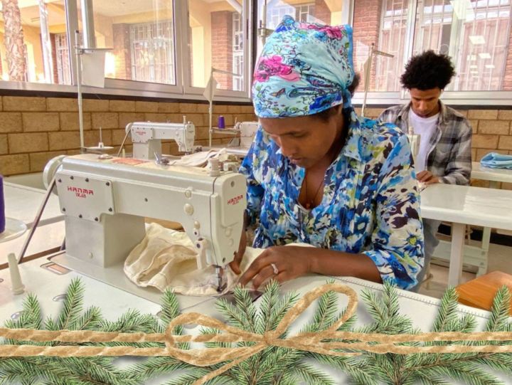 Ethiopian woman learning to sew at vocational school