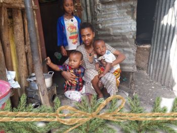 Family with twins living in poverty in Korah Ethiopia mud hut