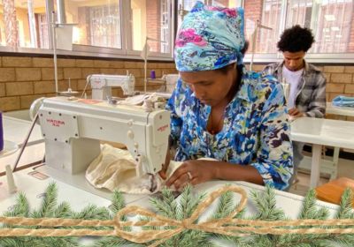 Ethiopian woman learning to sew at vocational school